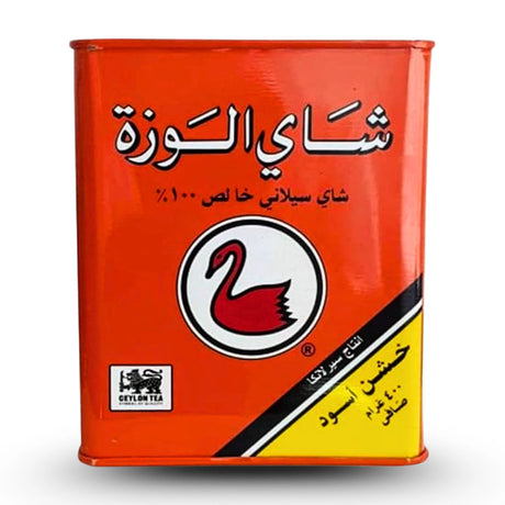 Red tea canister with a swan logo on a white background
