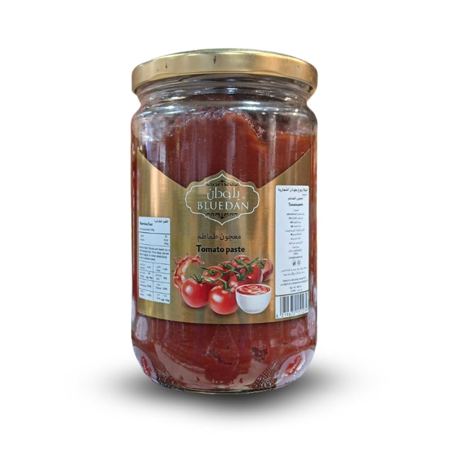 Jar of tBluedan Natural Tomato Paste, 660g,concentrated, rich tomato flavor for cooking, Now Availale At Palmyra Orders UAE.