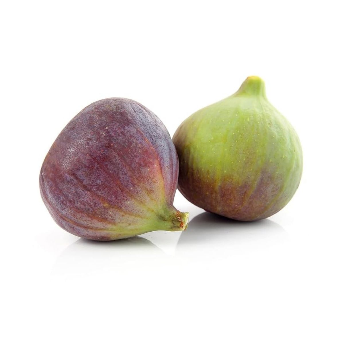 Two figs, one purple and one green, on a white background