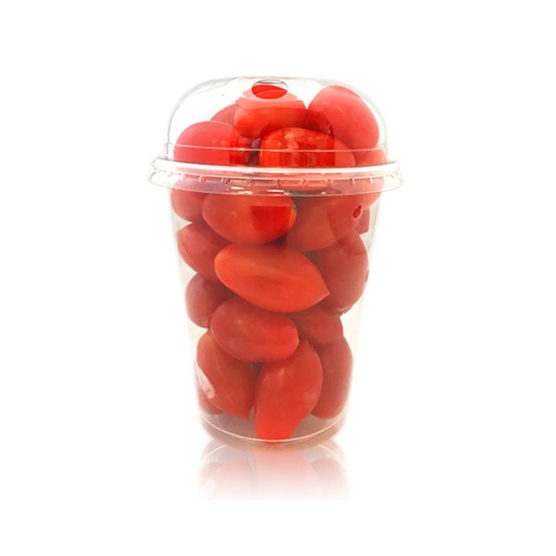 Clear plastic container filled with red tomatoes on a white background