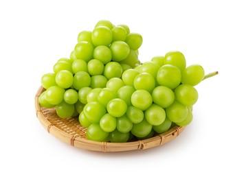 “Shine Muscat grapes in a bowl with bright green skin.”