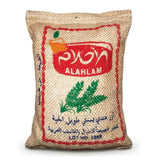 Jute bag with 'Al Ahlam' branding on a white background