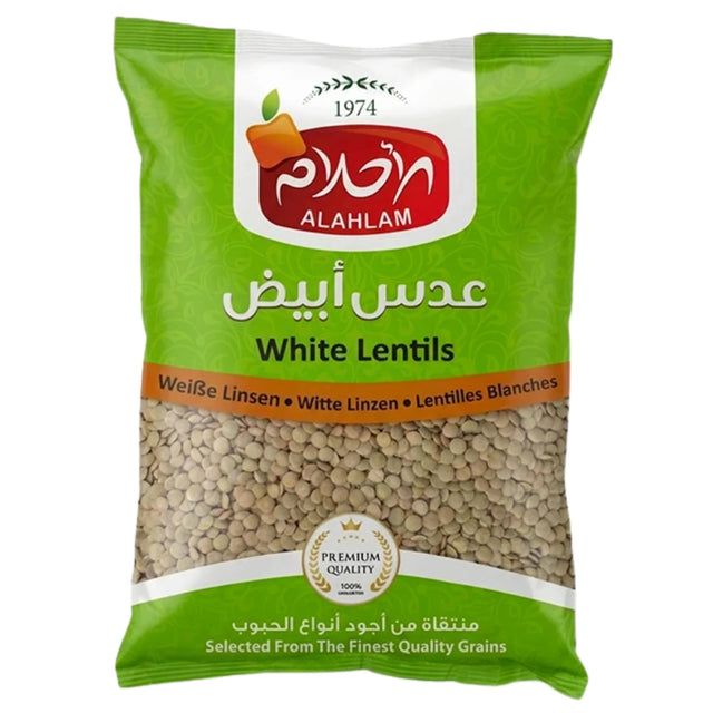 Green package of Al Ahlam white lentils on a white background