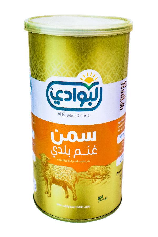 "1kg jar of Al Bawadi Arab sheep ghee, made from 100% pure milk, adding rich, buttery flavor to dishes. Ideal for frying, sautéing, and baking with its high smoke point."