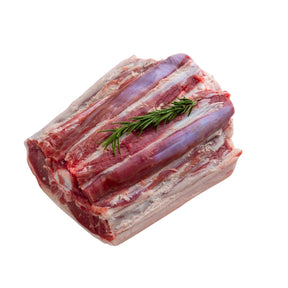 Raw meat with rosemary on a white background