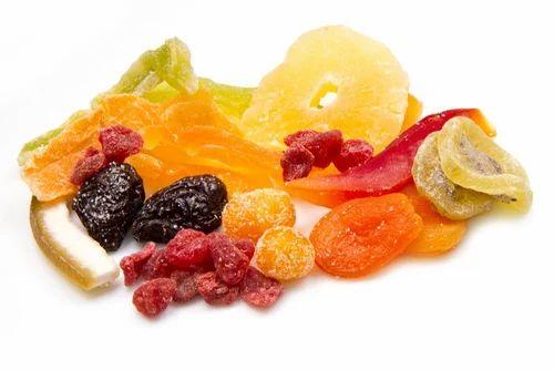 "dried mix fruits – a colorful assortment of dried apricots, raisins, pineapple, and mango, showcasing vibrant colors and natural textures, perfect for healthy snacking or adding to recipes."