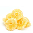 "Close-up of dried pineapple rings, showcasing their vibrant yellow color and natural, wrinkled texture."