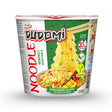 Cup of Dudomi vegetable noodles with packaging details on a white background