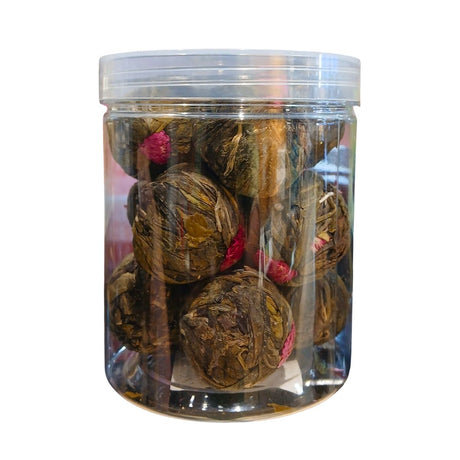 Clear jar filled withGreen Tea with Jasmine Blossom Flowers, 150g on a white background