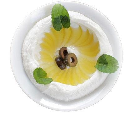 "creamy syrian labneh, a traditional strained yogurt perfect for spreading, dipping, or enhancing dishes."