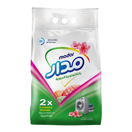 Madar Automatic Washing Powder Nature's Flowers – 3kg packaging with washing machine and flowers on a white background