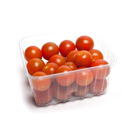 Clear plastic container filled with cherry tomatoes on a white background