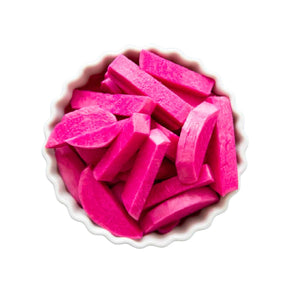 Pink candy pieces in a white bowl on a white background