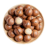 Roasted Macadamia in Shell, Coffee Taste, 500g, Wooden bowl filled with macadamia nuts on a white background