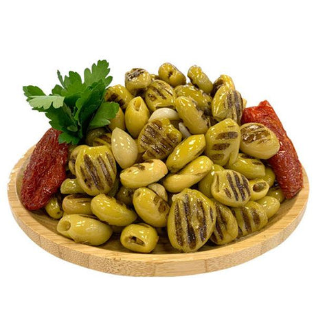 "Syrian Grilled Olives with a smoky, rich flavor."